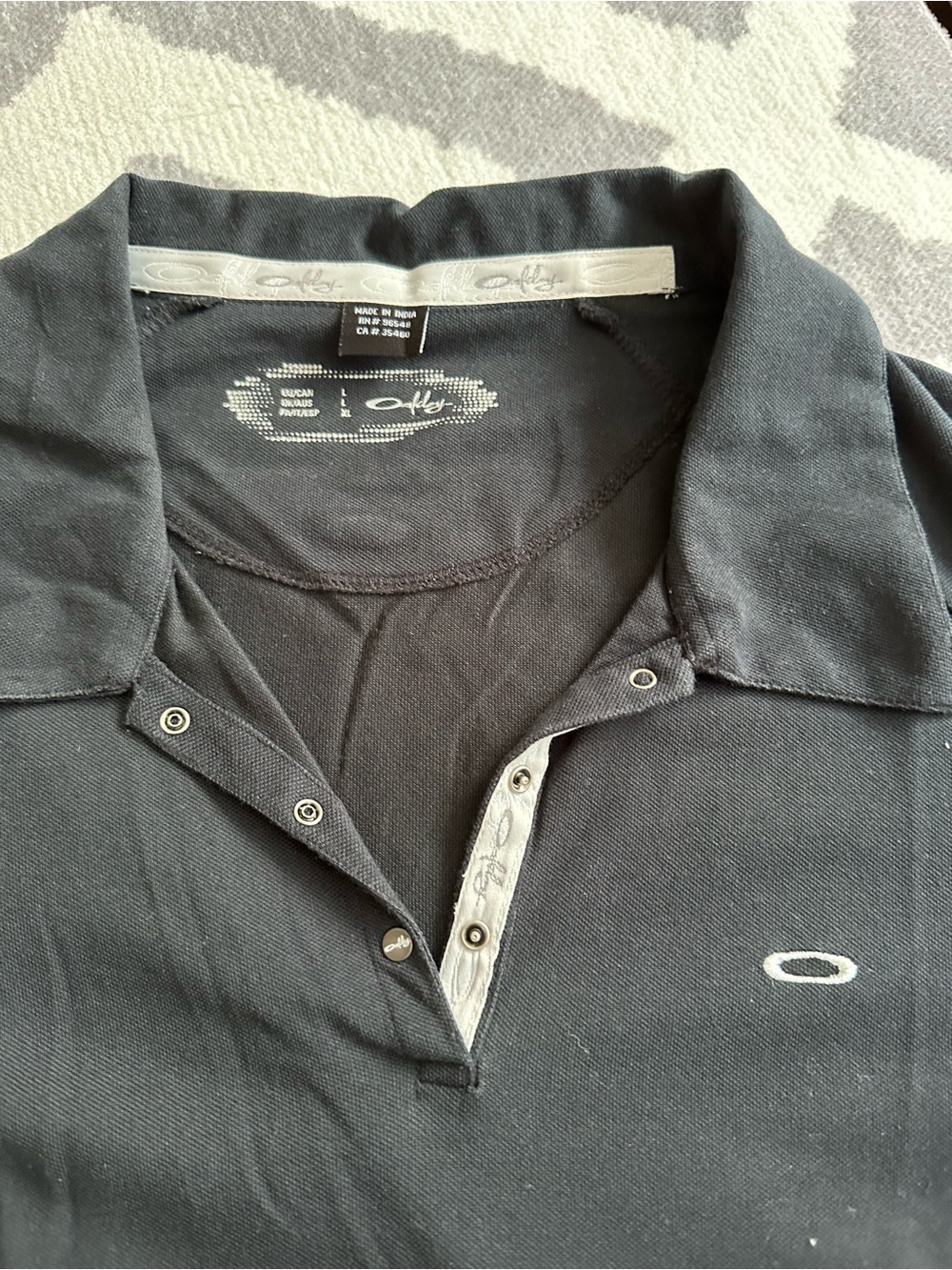 Oakley women’s Black Polo Shirt golf shirt